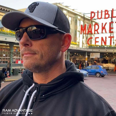 BRANDON DINOVI wearing a RAM ADVANTAGE premium HEATHER GREY and BLACK 3D embroidered TRUCKER HAT in SEATTLE  at PIKE PLACE MARKET